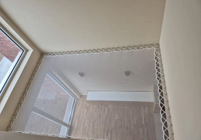 Installatie van Veiligheidsnet in een Woning